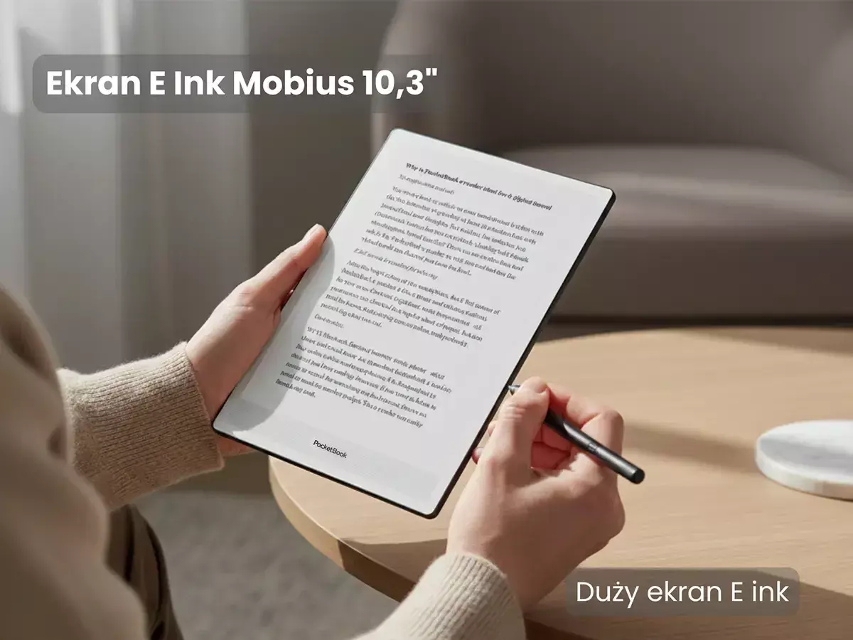 Marketingowe zdjęcie czytnika InkPad One trzymanego w dłoniach (wraz z rysikiem). Napisy: Ekran E-Ink Mobius 10,3" i Duży ekran E-ink
